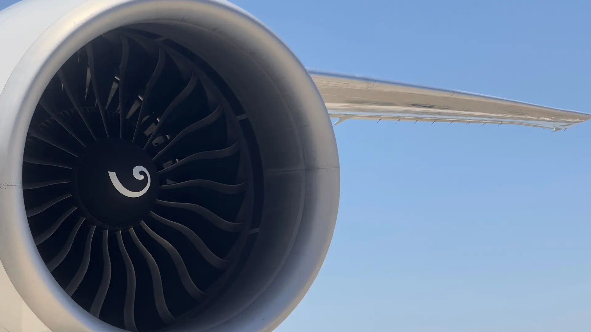 close up of airplane engine against the sky